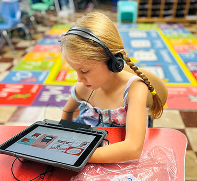 Fabius-Pompey student using technology