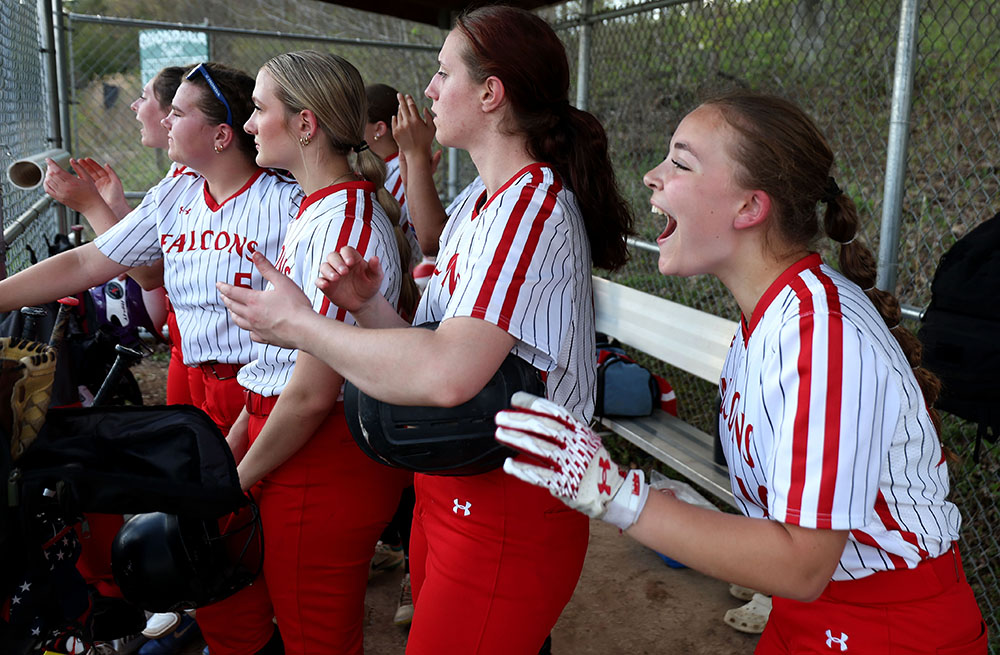 Fabius-Pompey softball players in dugout