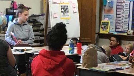 Public Speaking Class reads to Elementary Students